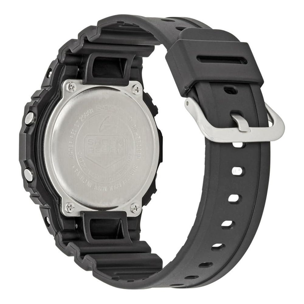 Orologio G-Shock nero con fibbia argentata e scritta shock resist sul retro.
