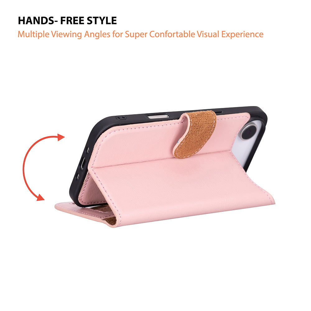 Stand olarak kullanılan pembe bir telefon kılıfı. Telefon takılı.