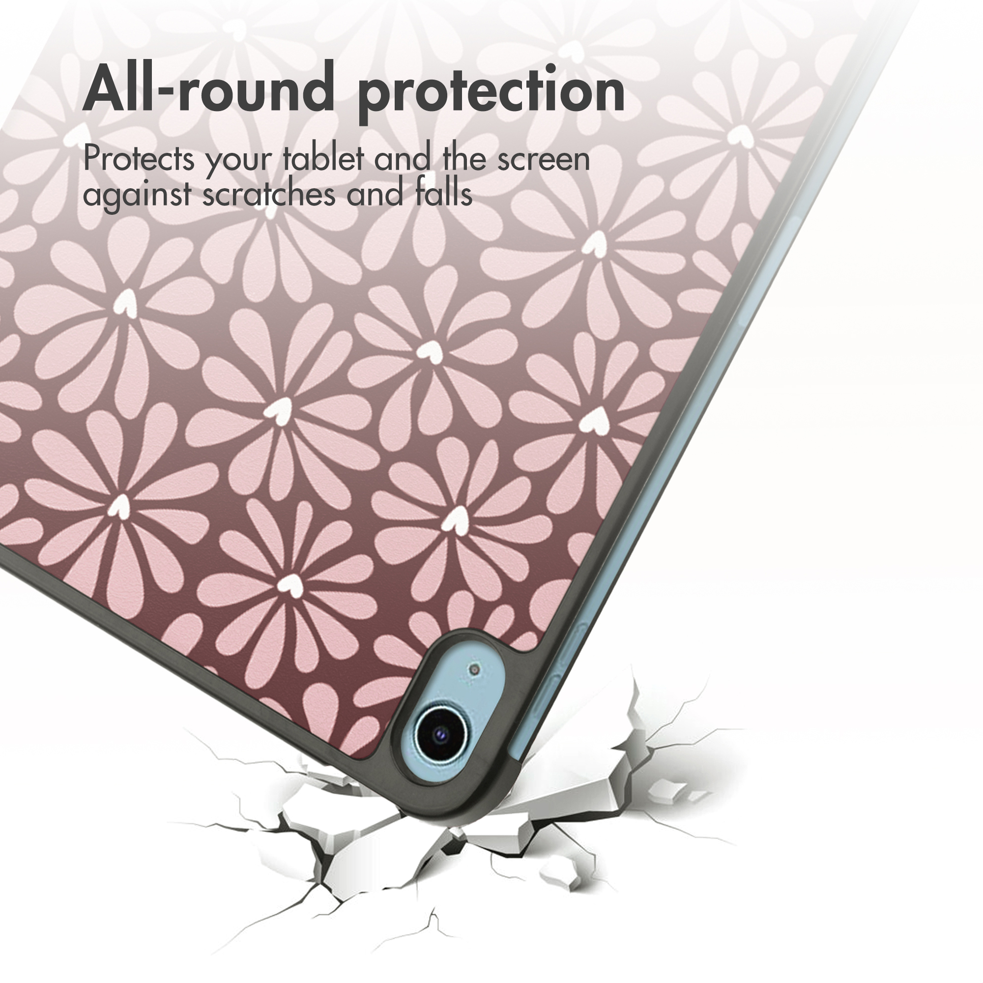 Tablet case with floral pattern falls, cracks white surface.