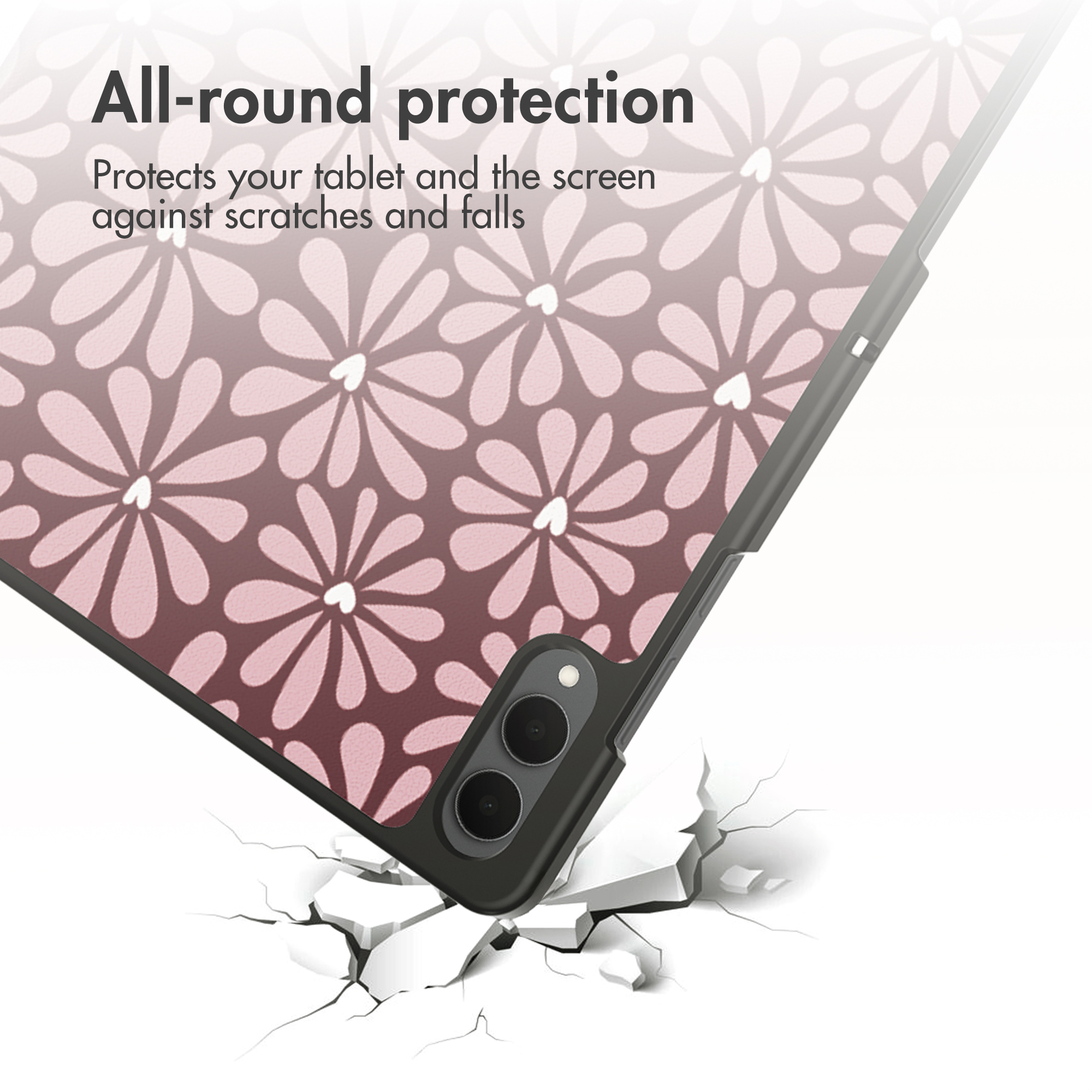 A tablet case with a floral pattern is shown falling onto a cracked surface.
