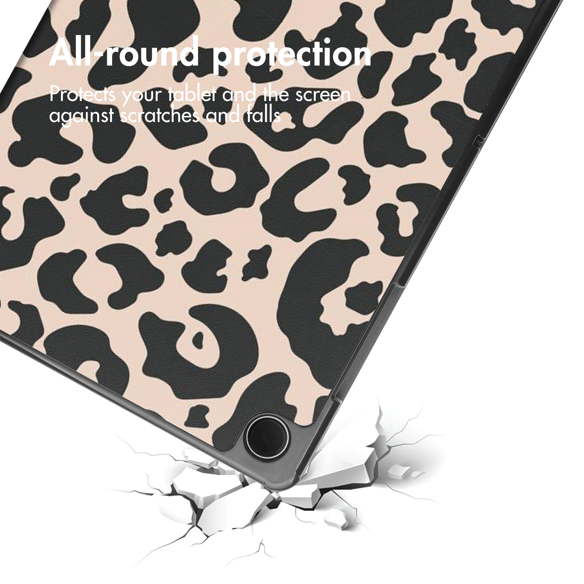A tablet case with a leopard print falls and breaks a white surface.