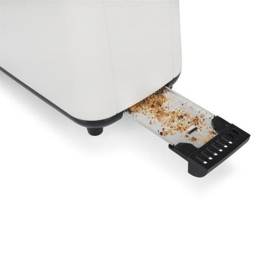 Weiße Toaster-Krümelschublade mit braunen Krümeln.