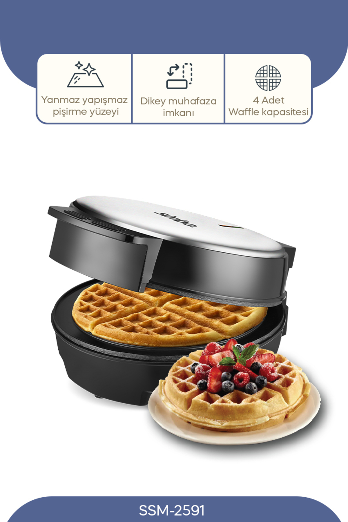 Çilek ve böğürtlenle süslenmiş bir waffle'ın da dahil olduğu gofret makinesi.
