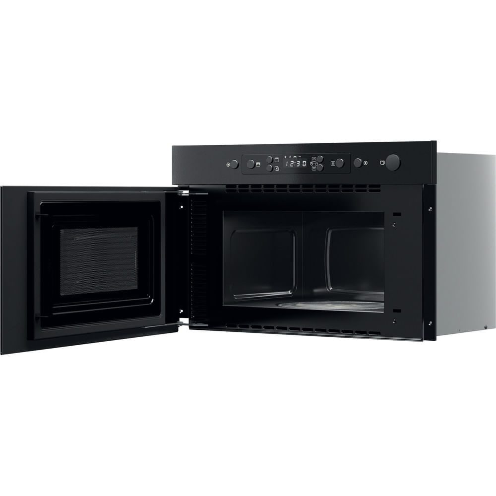 Un forno a microonde da incasso nero con la porta aperta, che mostra l'interno.