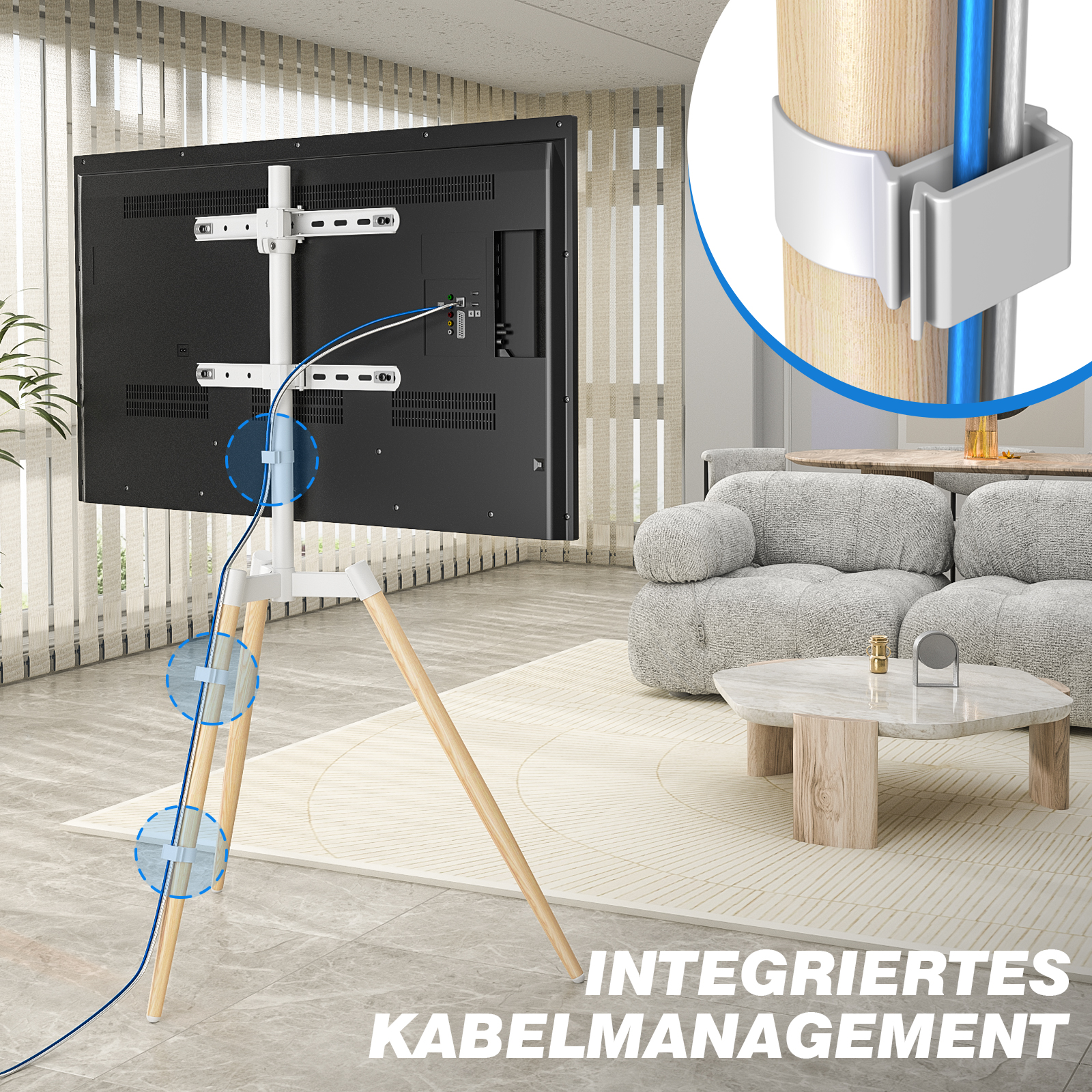 Ein Fernseher auf einem Stativ mit integriertem Kabelmanagement in einem Wohnzimmer.