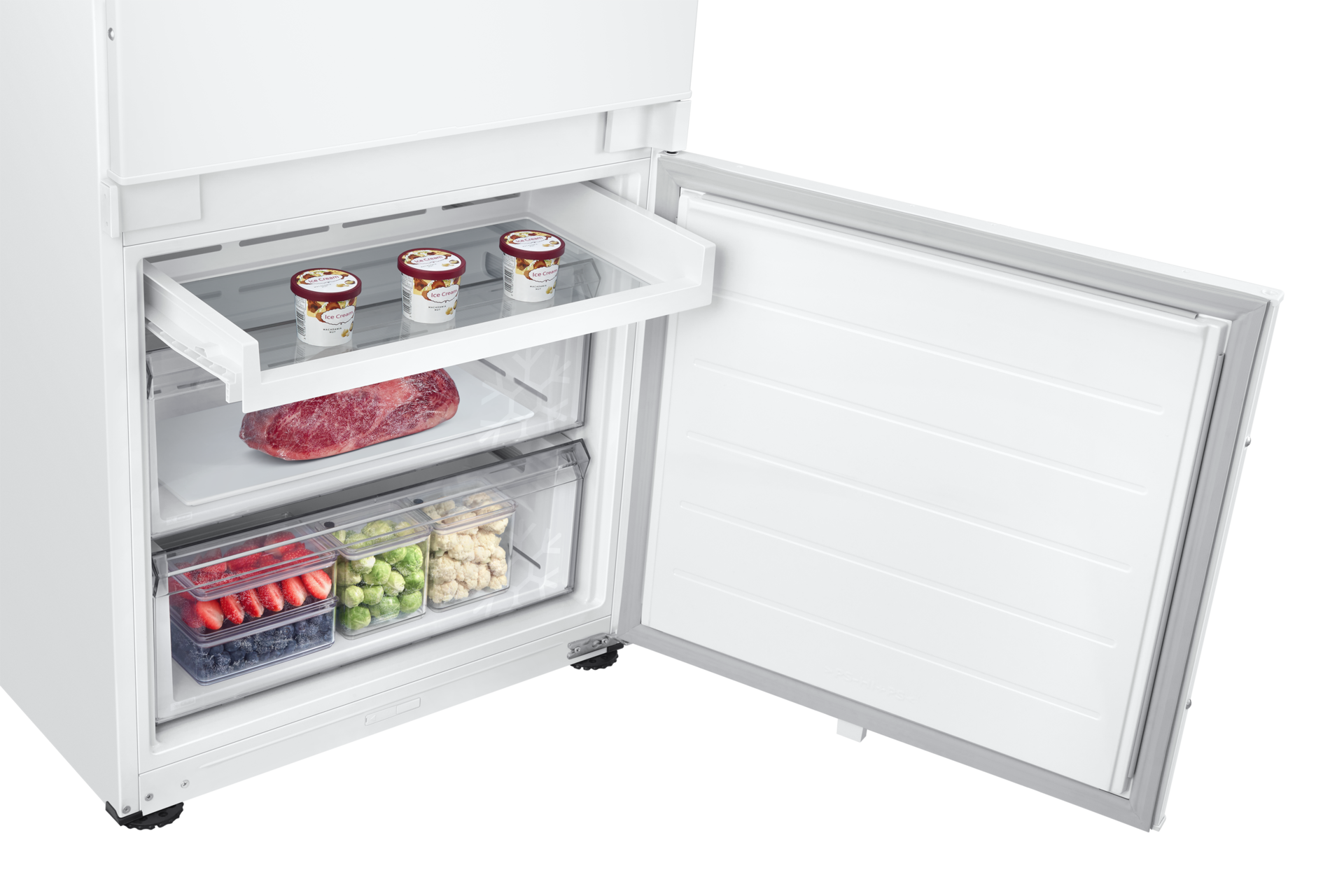 Cassetto congelatore con gelato, carne cruda, bacche, broccoli e cavolfiore.