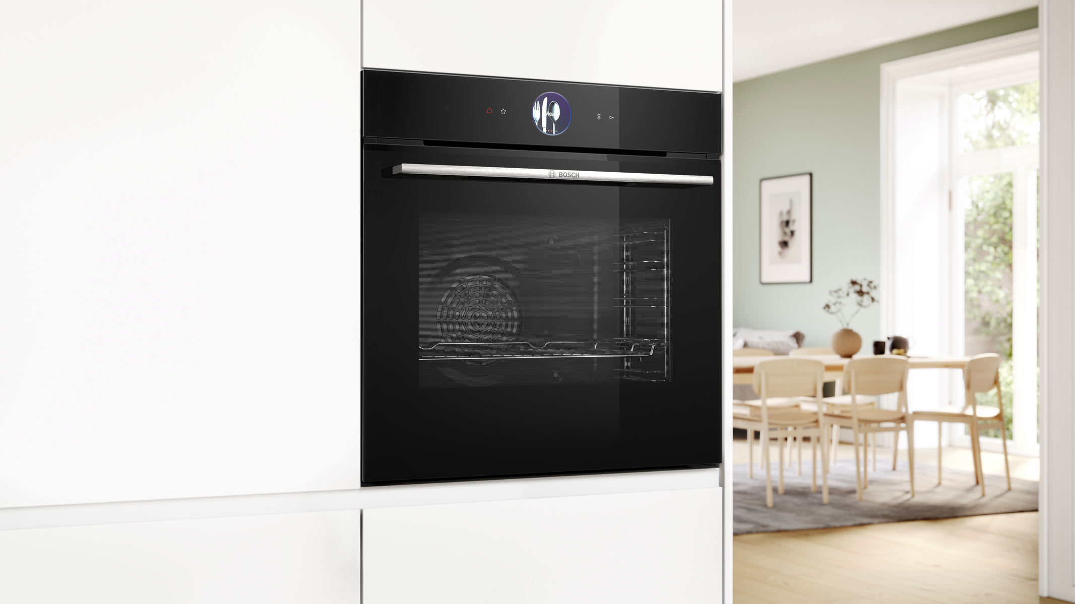Un moderno forno nero con touchscreen, accanto a una sala da pranzo con tavolo e sedie in legno.