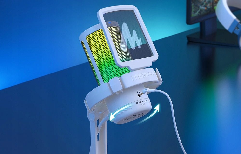 A white microphone with a screen and RGB lighting stands on a mount.
