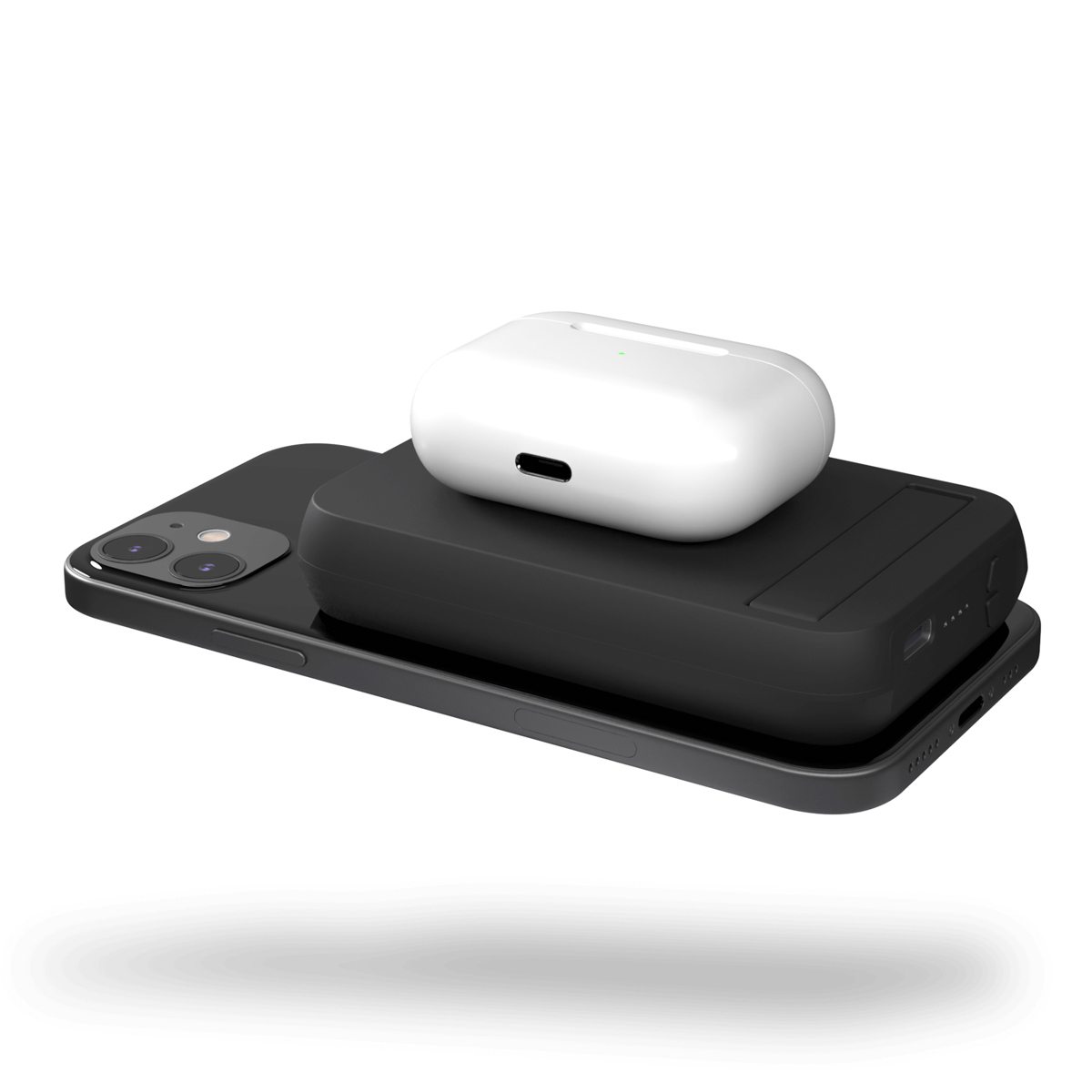 Ein schwarzes iPhone mit einem schwarzen Ladegerät und einem weißen Ladecase darüber.