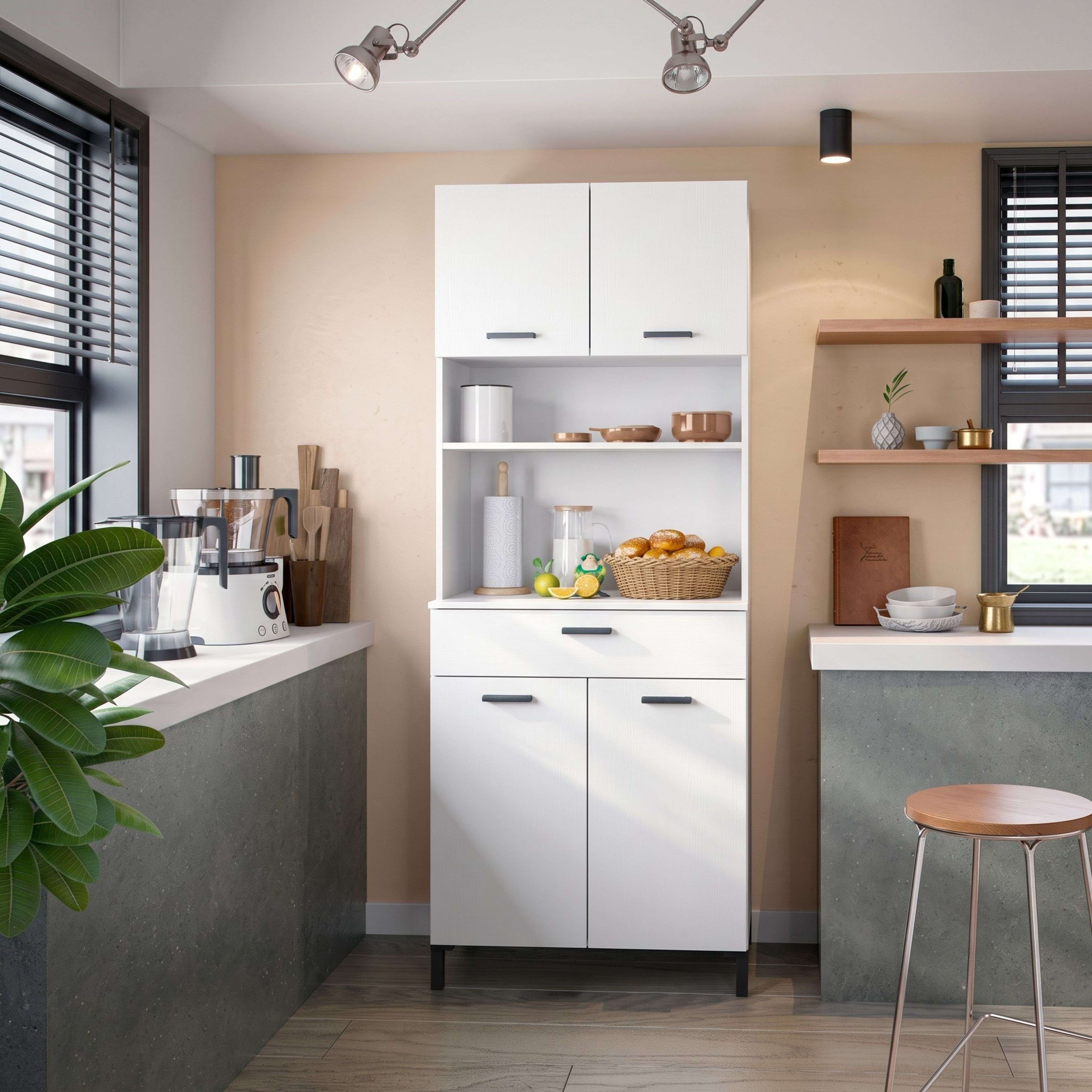 Armarios de cocina blancos modernos con frutas y platos, un taburete cerca.