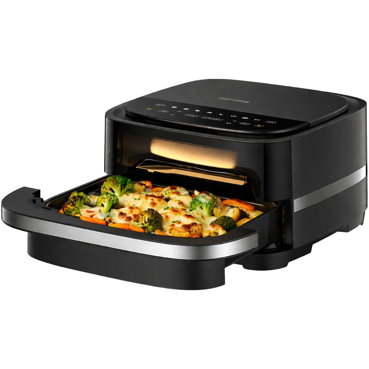 Een zwarte airfryer oven met uitgeschoven lade, gevuld met gegratineerde groenten.