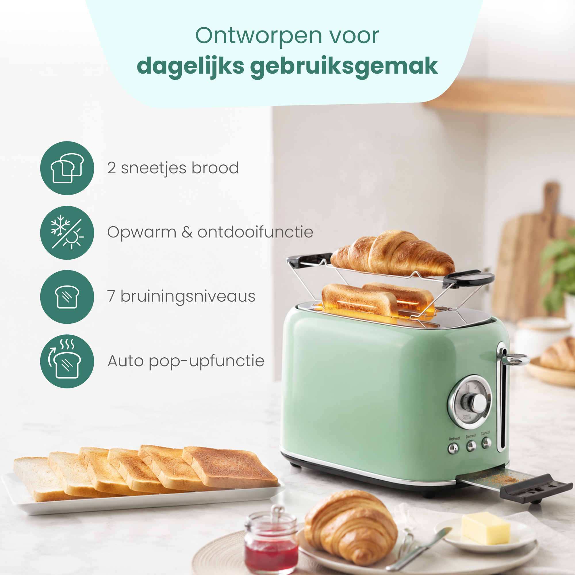 A green toaster with toast and croissants, next to bread and jam.