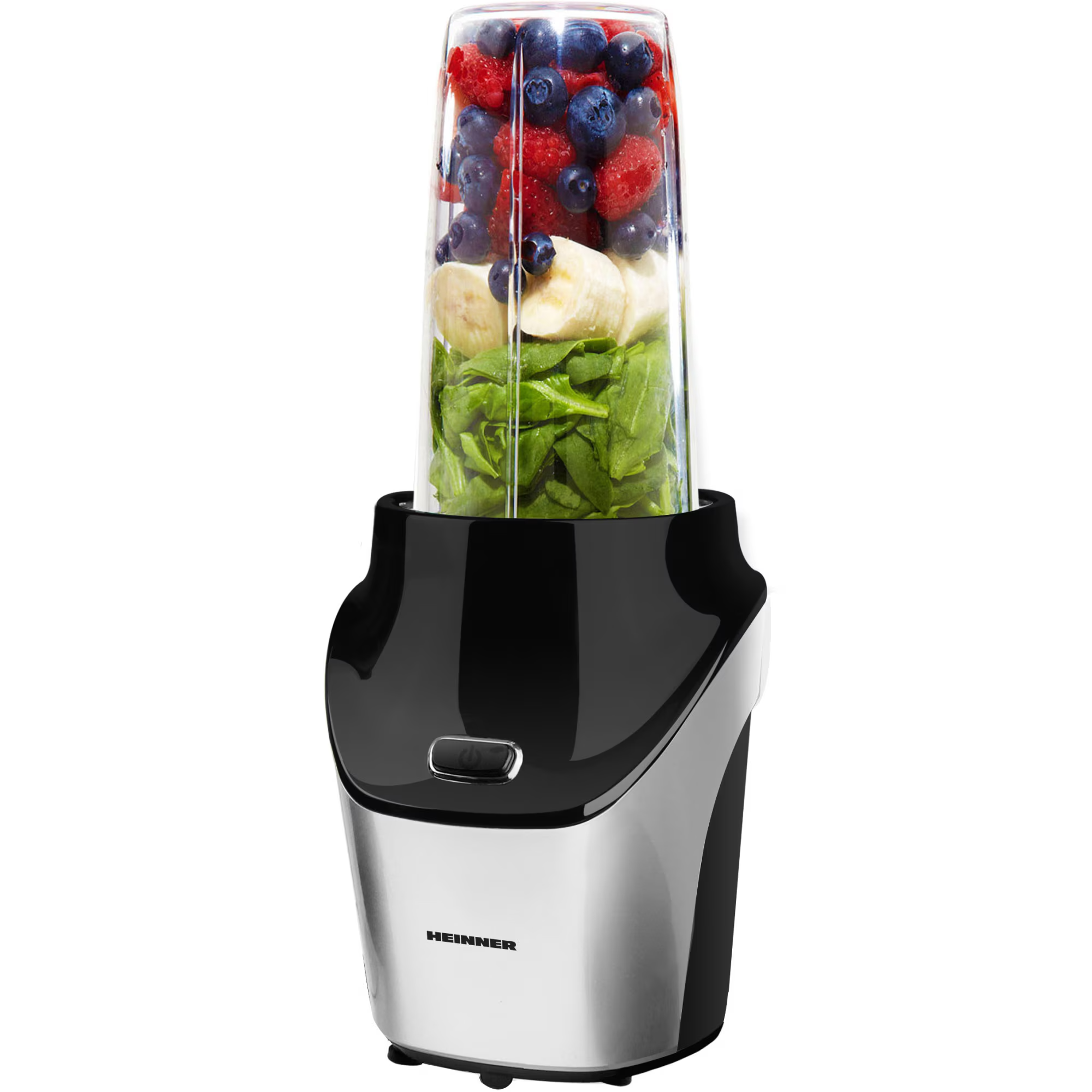 Ein Mixer mit Obst und Spinat, bereit zum Mixen.