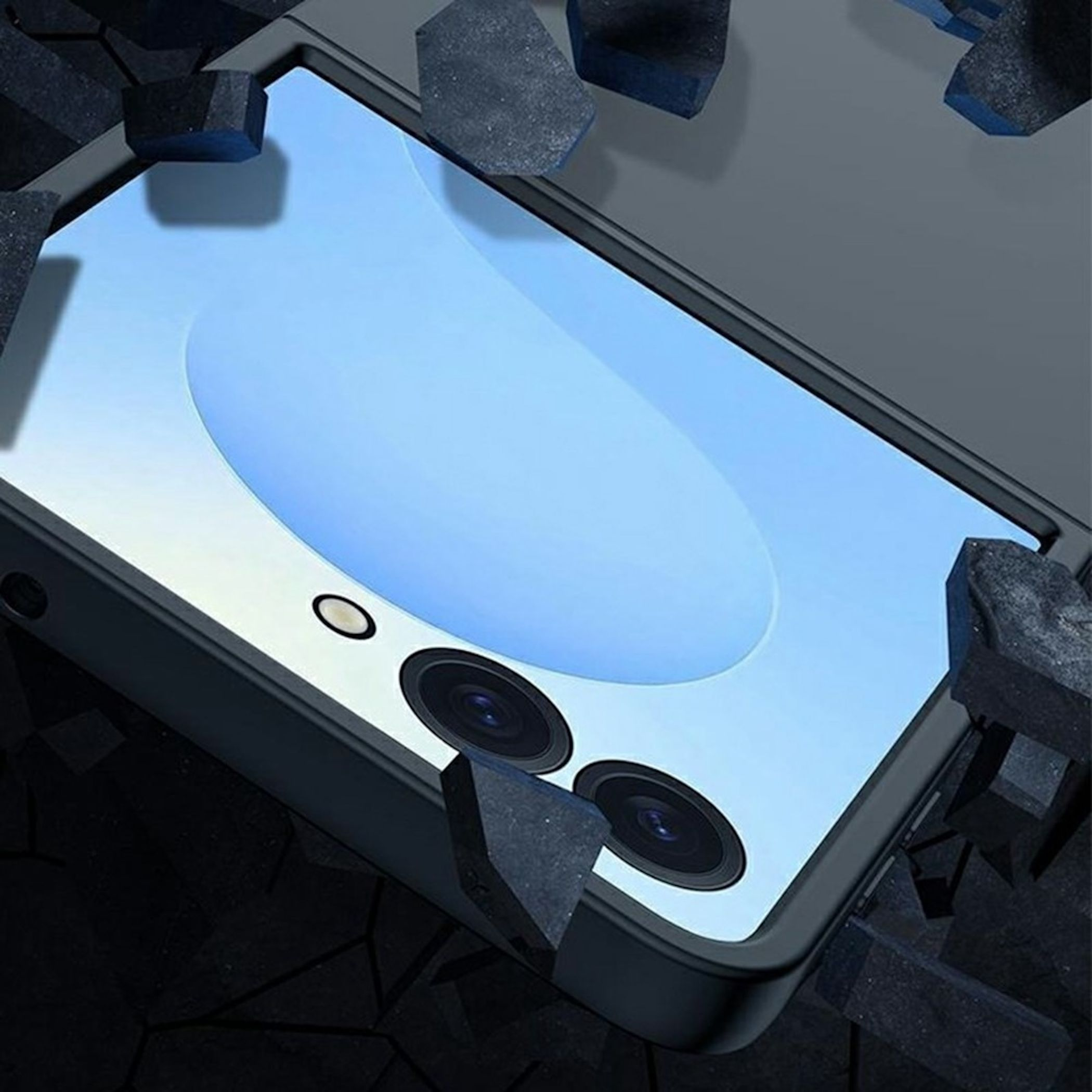 Schwarzes Smartphone mit zwei Kameras und blauen Reflexionen, umgeben von dunklen Steinen.