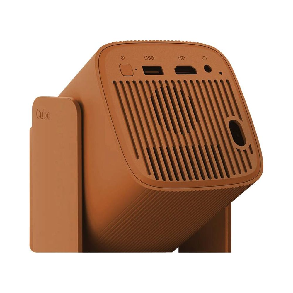 Ein brauner würfelförmiger Projektor mit USB- und HD-Anschlüssen oben.
