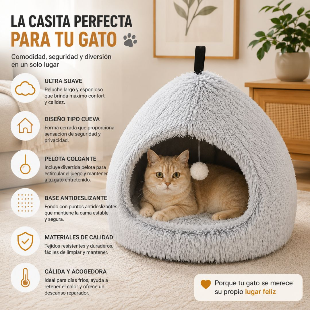 Un gato atigrado descansa en una suave cama gris para gatos con bola colgante.