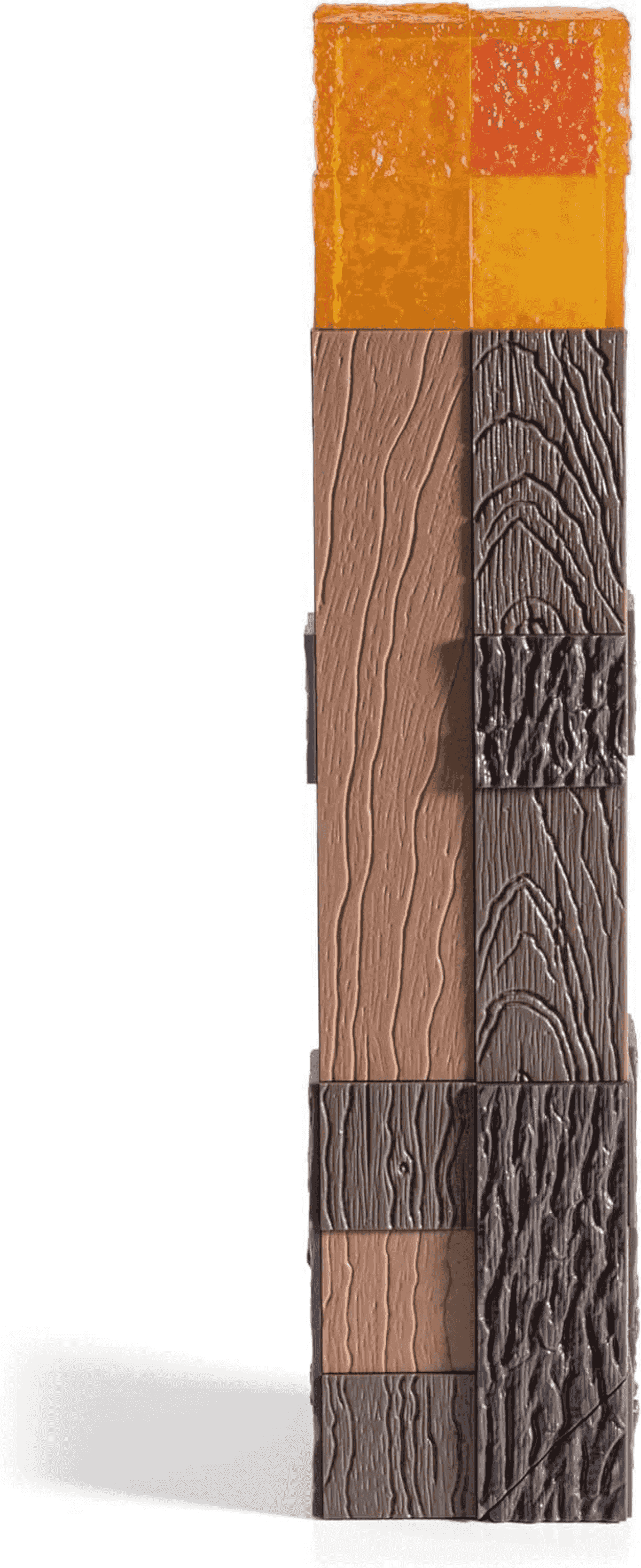 Un bloque vertical con texturas de madera y ámbar, que se asemeja a un torso.