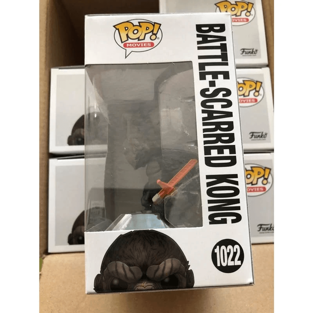 Figura Funko Pop! de Battle-Scarred Kong (Nº 1022) en una caja.