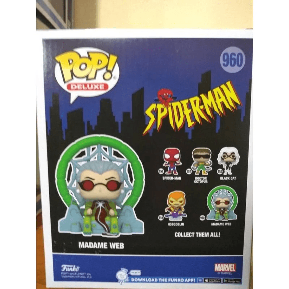 Scatola Funko Pop! con Madame Web e altre figure di Spider-Man.