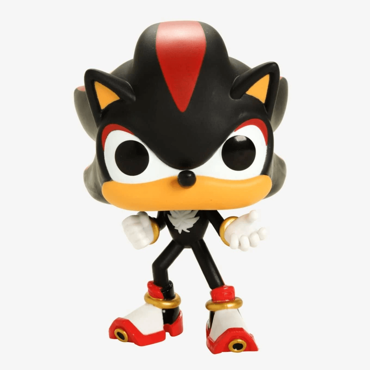 Un Funko Pop negro y rojo de Shadow the Hedgehog con guantes blancos.