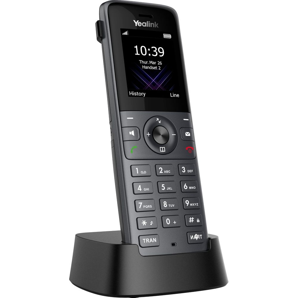 Un telefono cordless grigio Yealink poggia sulla sua base di ricarica.