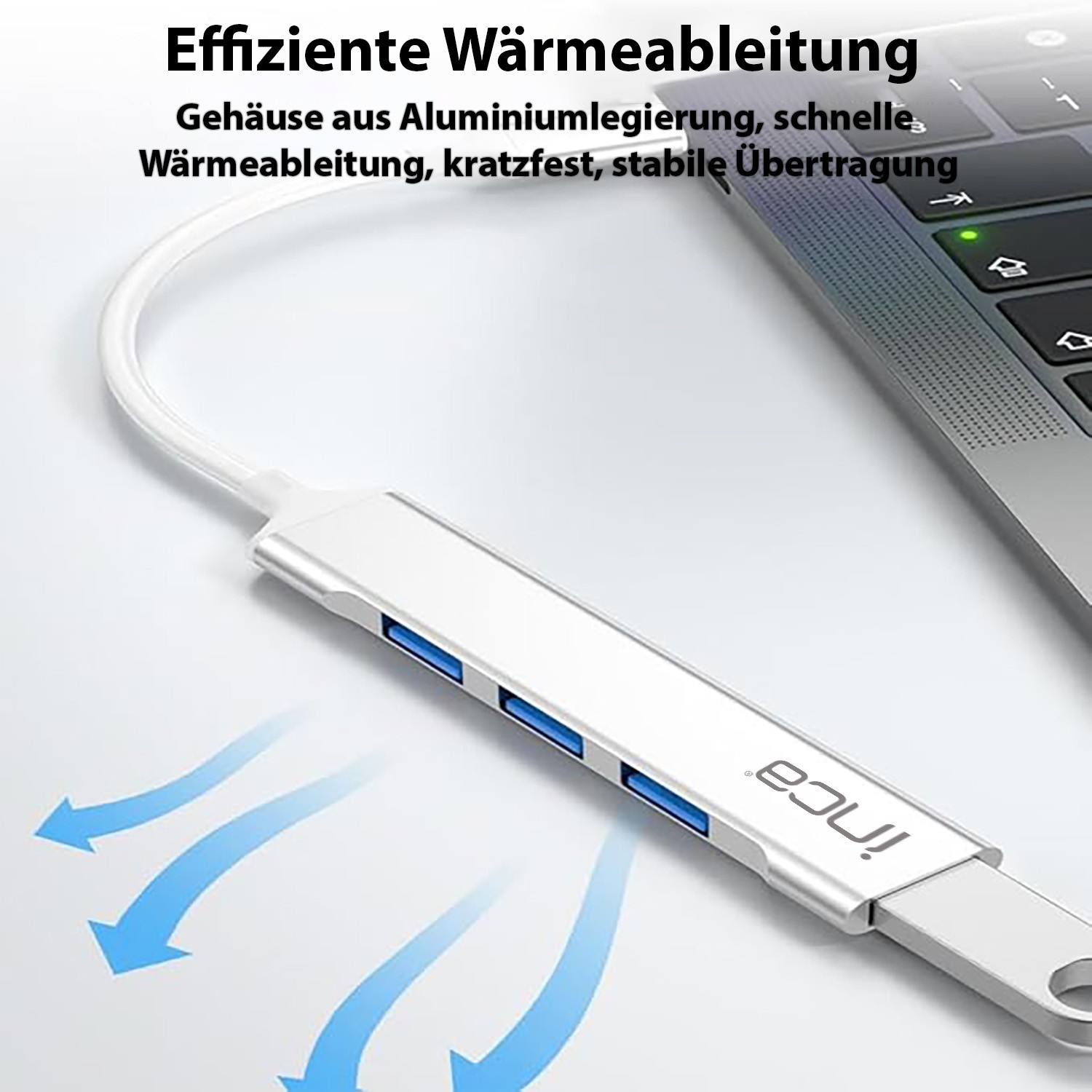 Hub USB argentato con porte blu e frecce di raffreddamento.