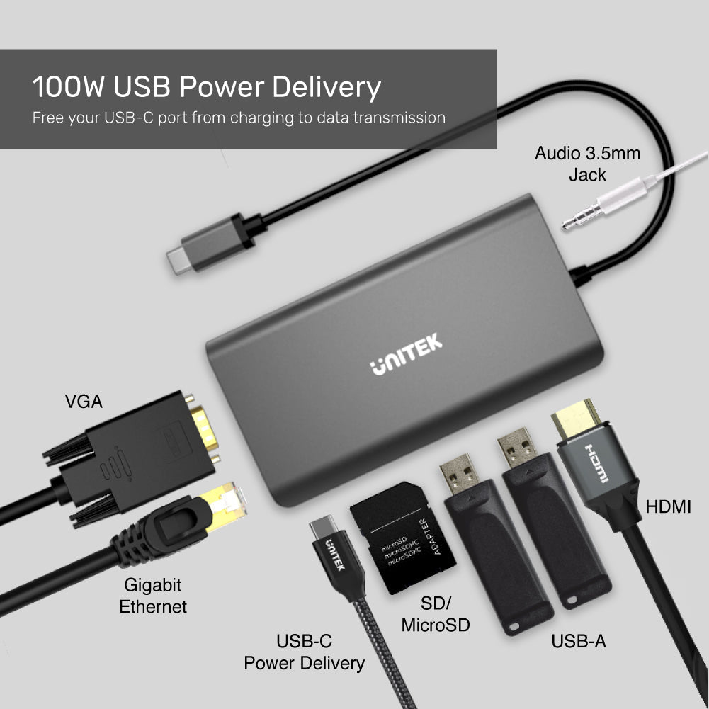 Un hub USB-C grigio con porte VGA, Ethernet, Audio e HDMI.