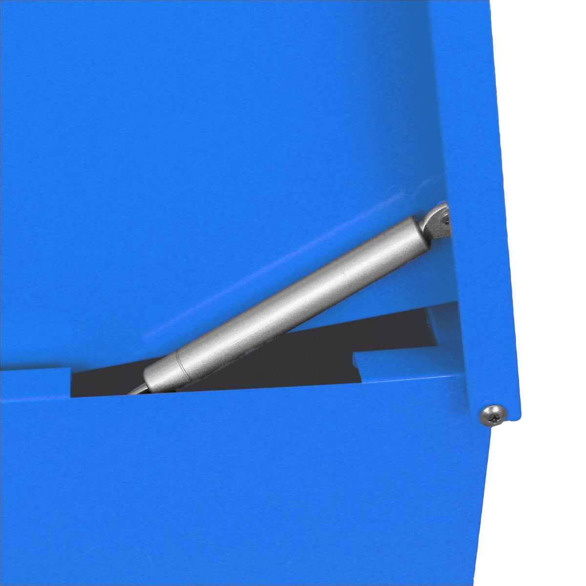 Un amortiguador de gas plateado está unido al interior de una caja de metal azul.