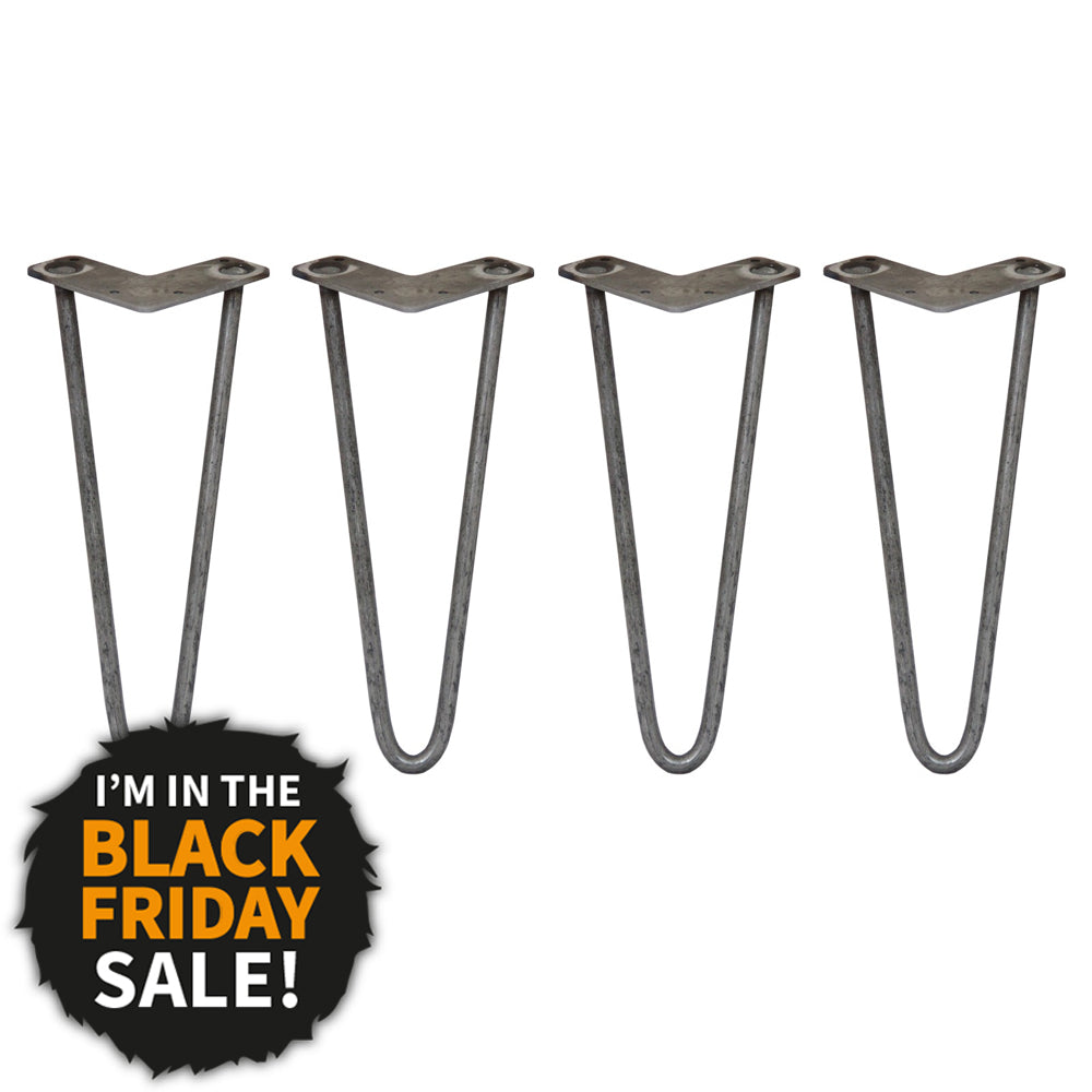 Cuatro patas de horquilla grises con placa de montaje y pegatina Black Friday Sale.