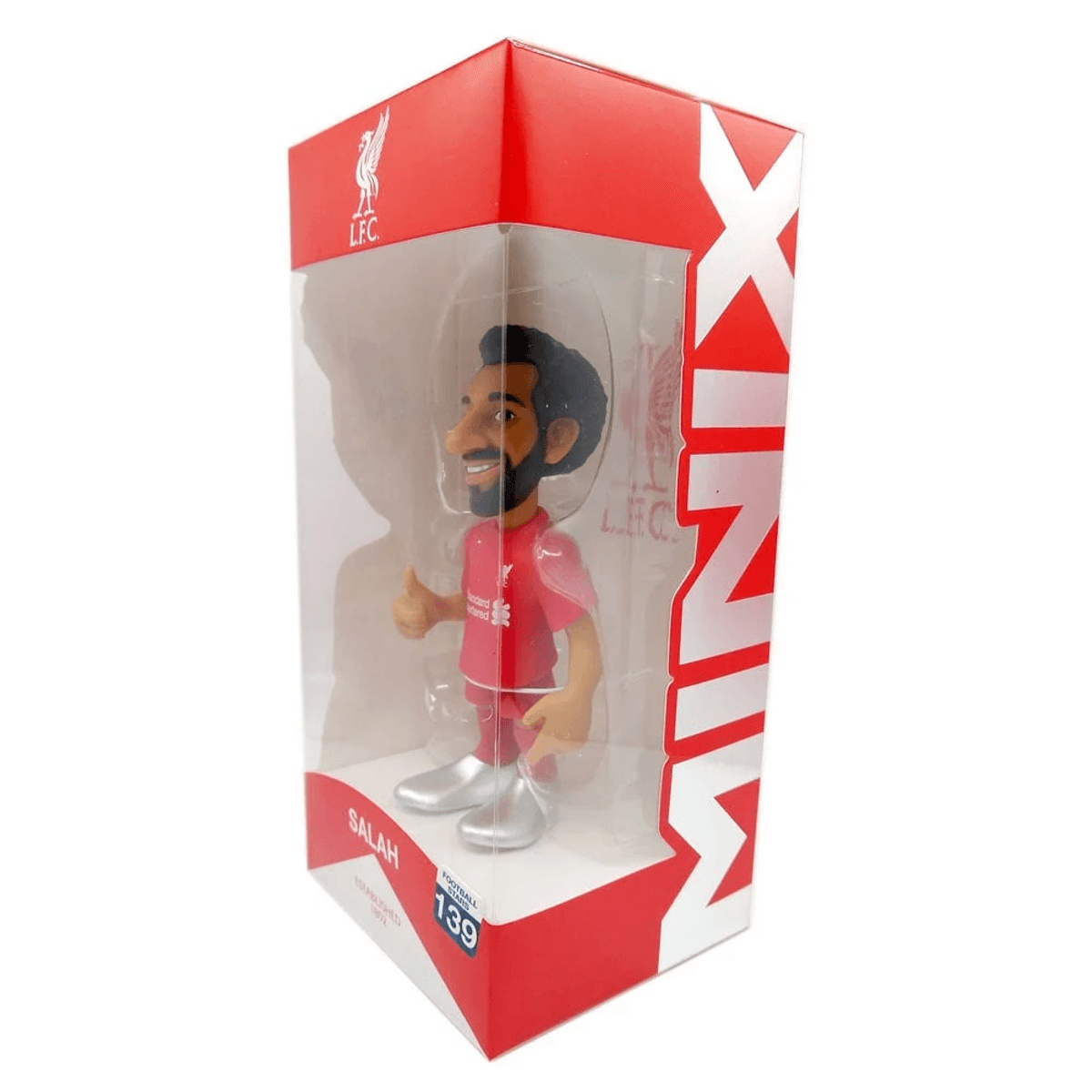 Figurita de fútbol de Salah con camiseta roja y zapatos plateados, pulgar arriba.