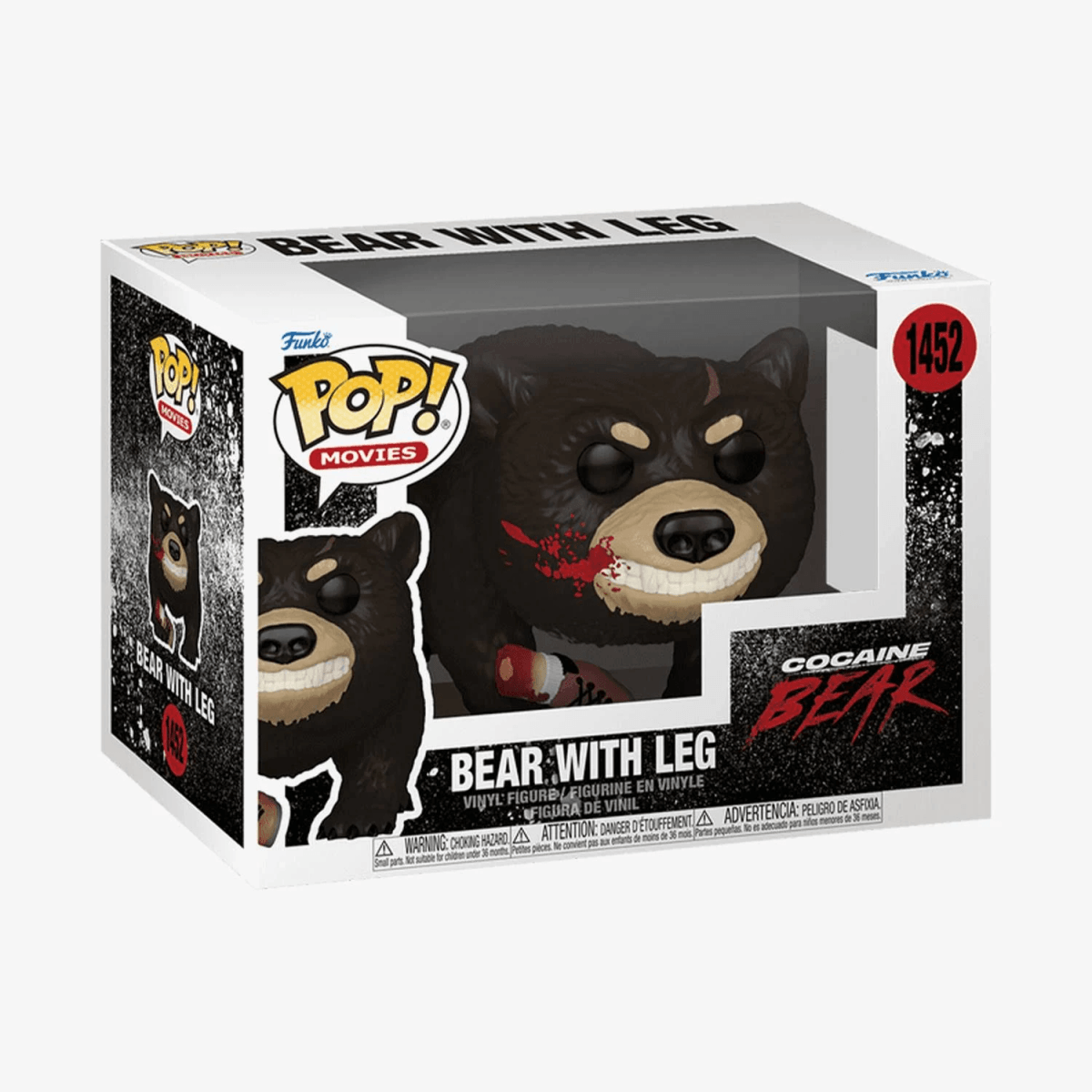 Una figura de vinilo Funko Pop! de Cocaine Bear, con hocico ensangrentado y extremidad seccionada.
