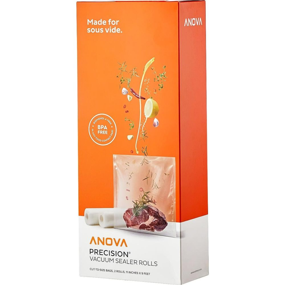 Anova Vakuumierrollen-Verpackung mit rohem Fleisch, Kräutern und Zitrone.