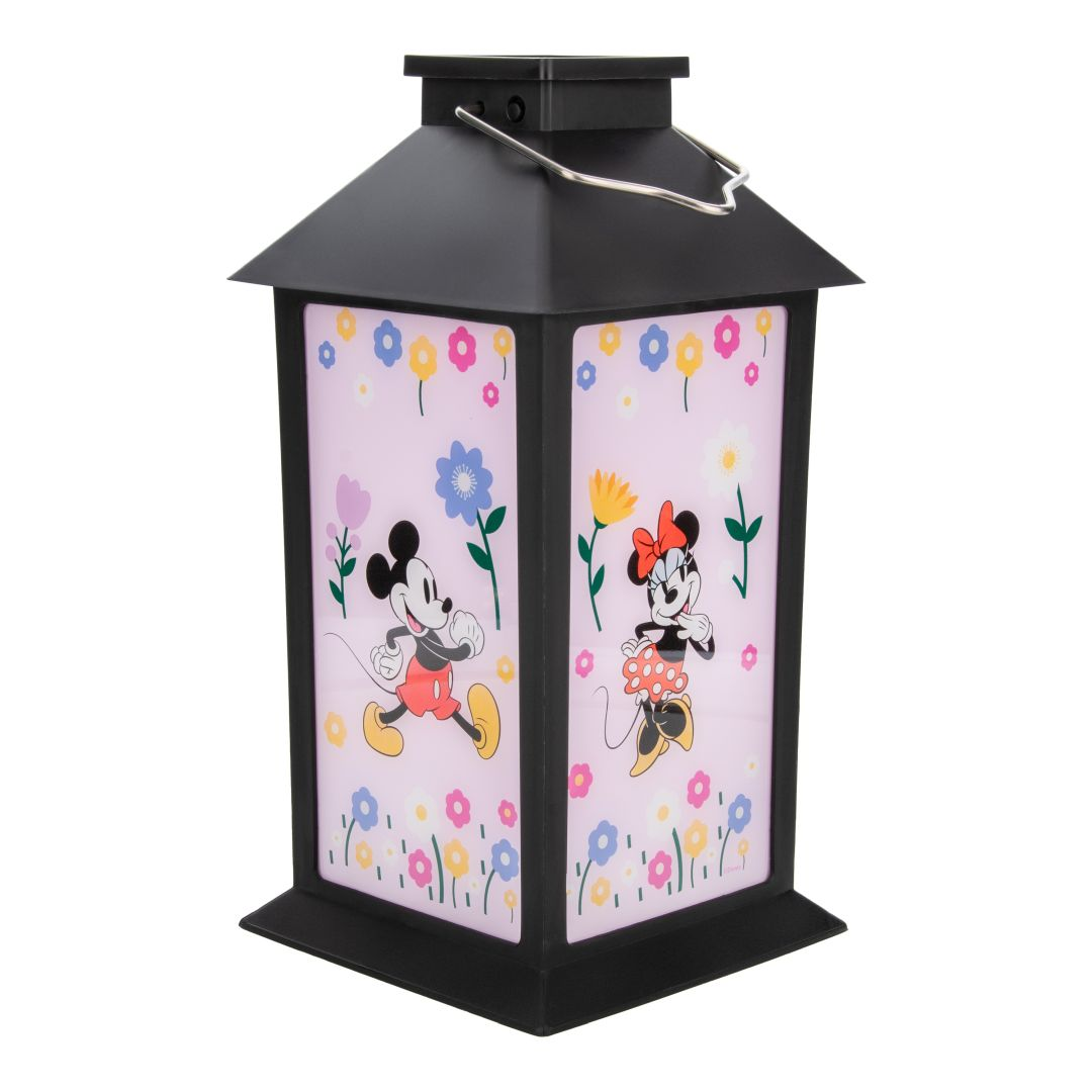 Czarna latarnia z Myszką Mickey i Minnie na różowym tle z kwiatami.
