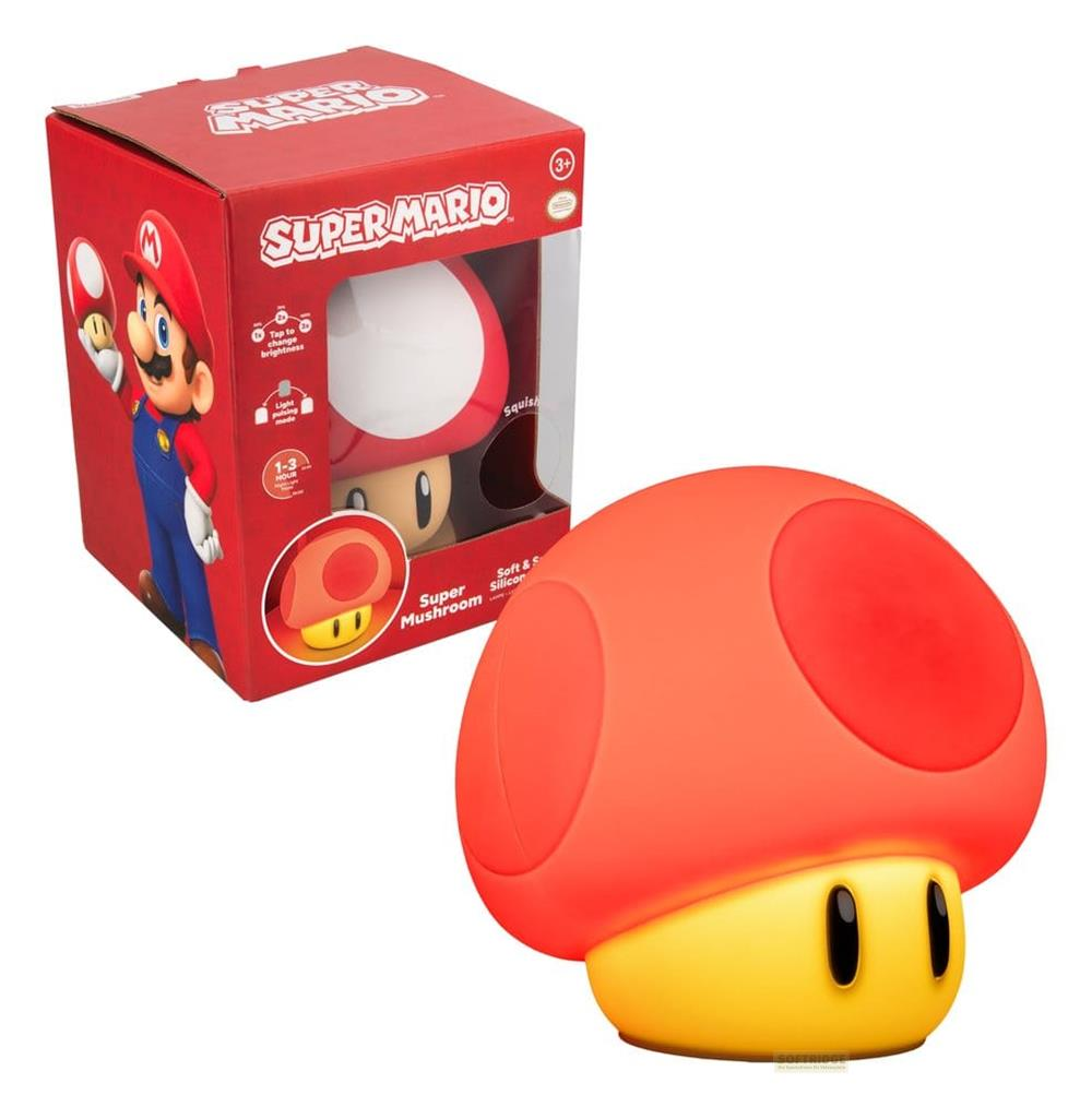 Lampa Super Grzyb obok pudełka z Mario.