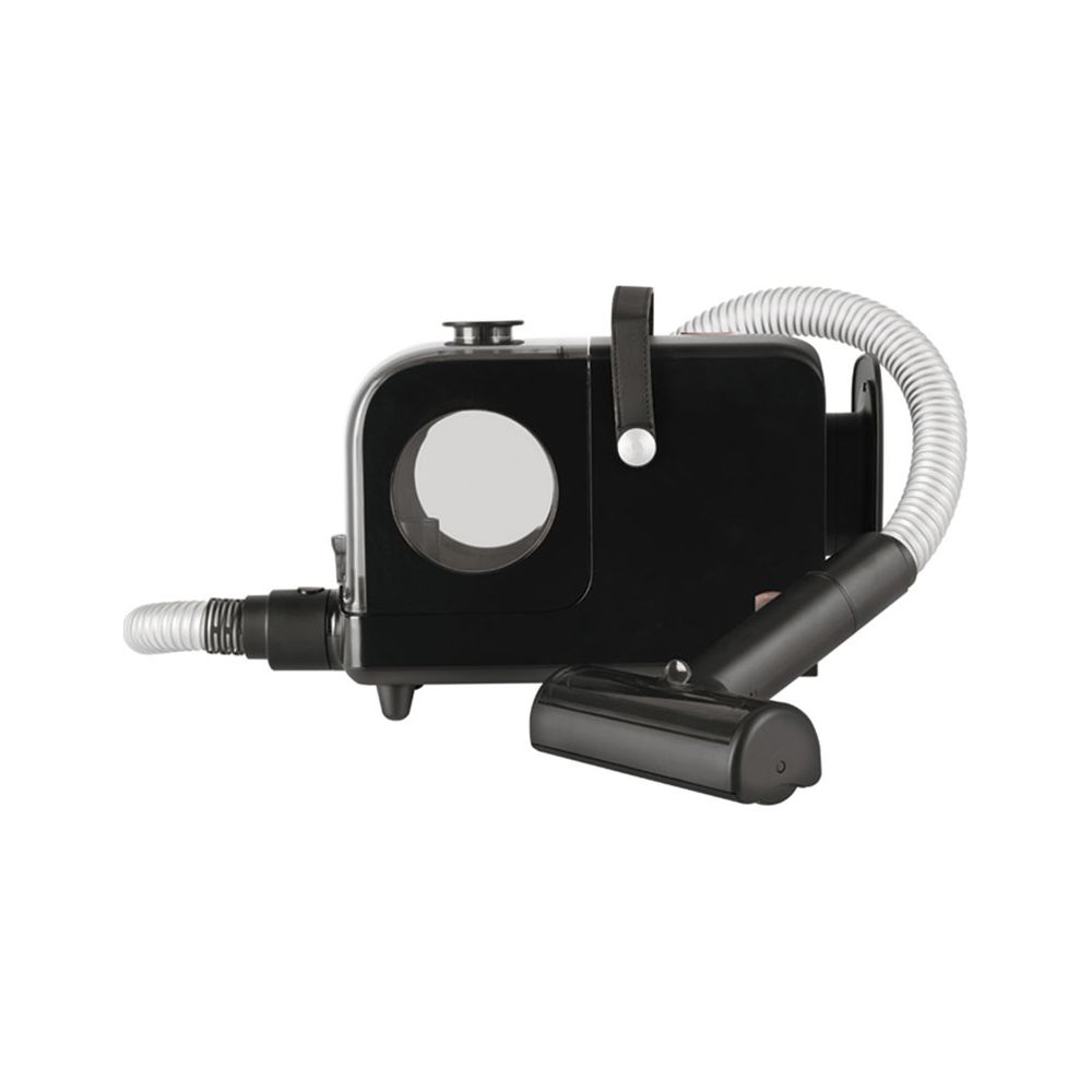 Un aspirateur noir et compact avec tuyau et brosse.