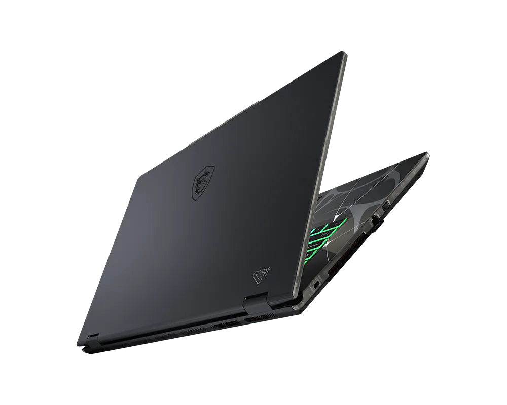 Un laptop MSI nero è aperto, mostrando una tastiera verde e un design unico del coperchio.