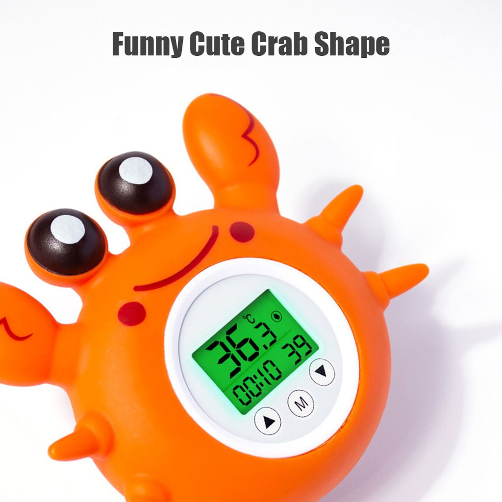 Ein orangefarbener digitaler Thermometer in Krabbenform mit einem grünen Bildschirm.
