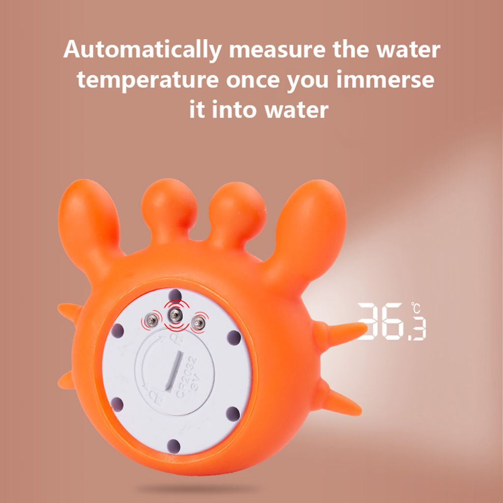 Ein orangefarbener Krabben-Thermometer mit einer Anzeige von 36,3°C.