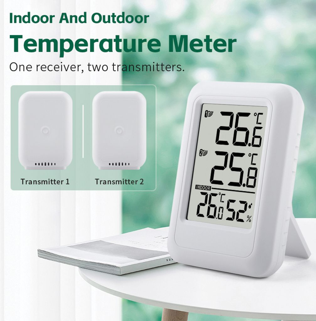 Ein weißes digitales Thermometer mit zwei Sendern und einem Empfänger.