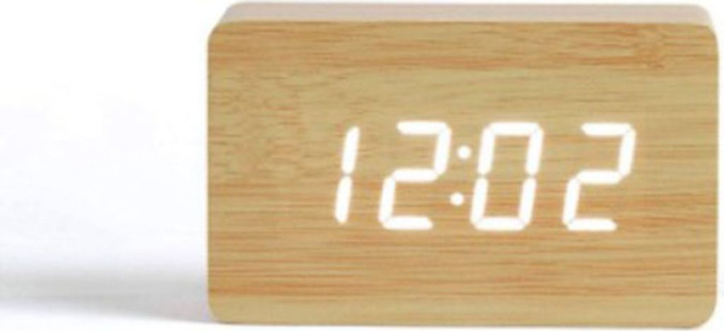 Ein Holzwecker zeigt 12:02 an.