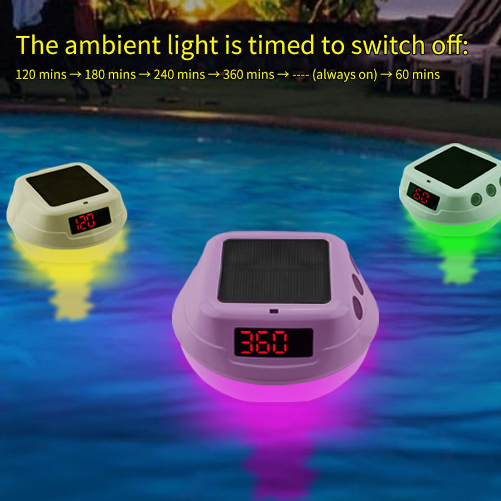 Drei schwimmende Poollichter, eins gelb, eins pink, eins grün, mit Timern.