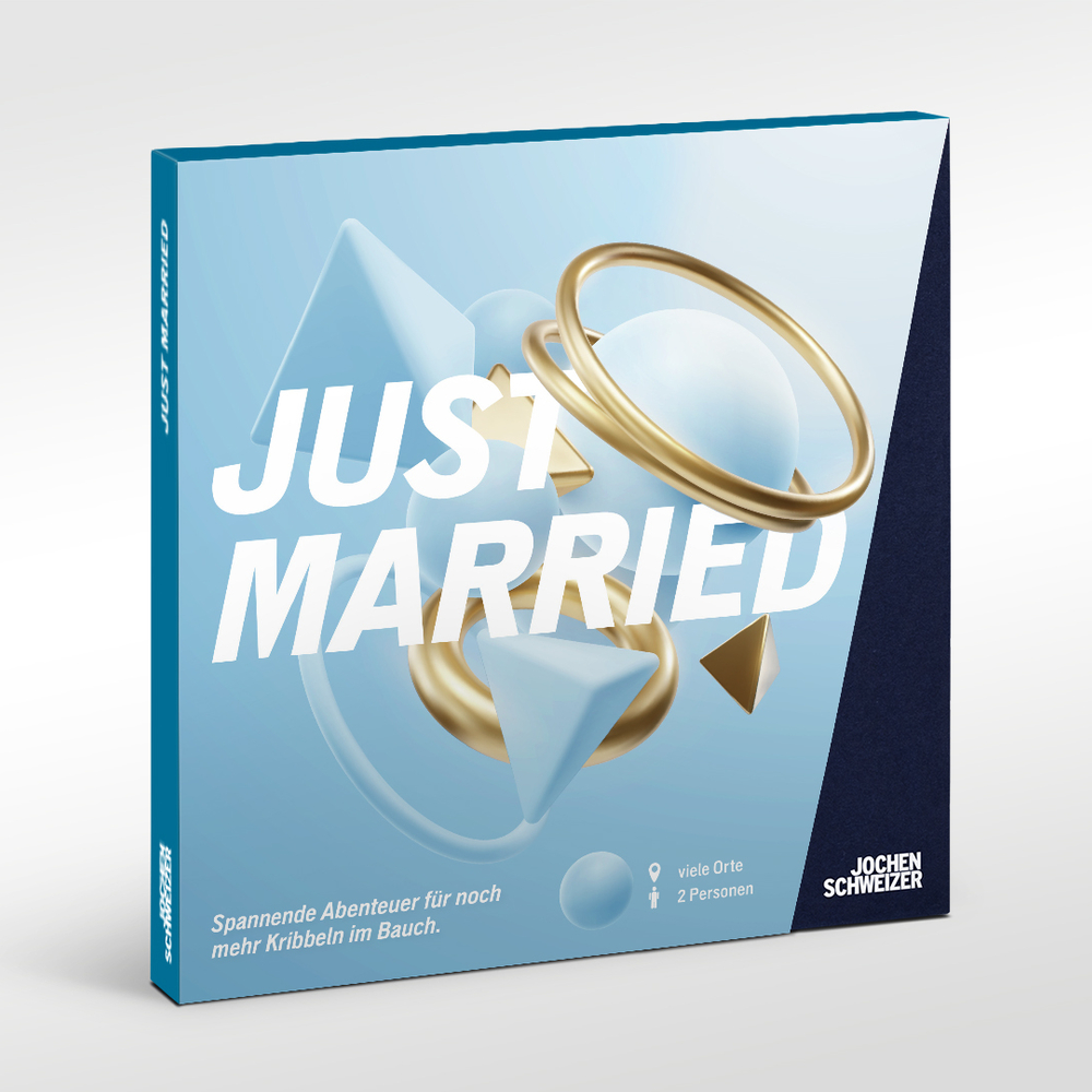 Spielbox mit geometrischen Formen, Ringen und "JUST MARRIED" Schriftzug.