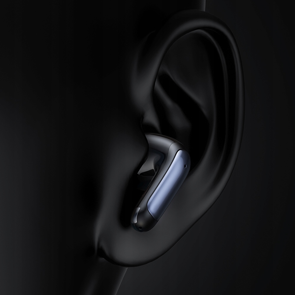 Un auricolare wireless è posizionato in un orecchio stilizzato nero.
