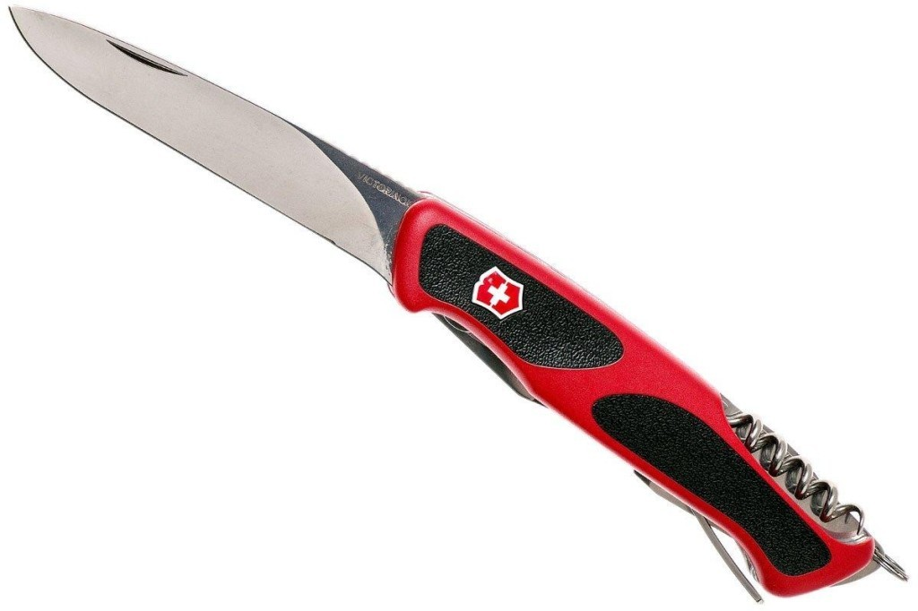 Gümüş bıçaklı ve tirbuşonlu kırmızı bir Victorinox çakı.