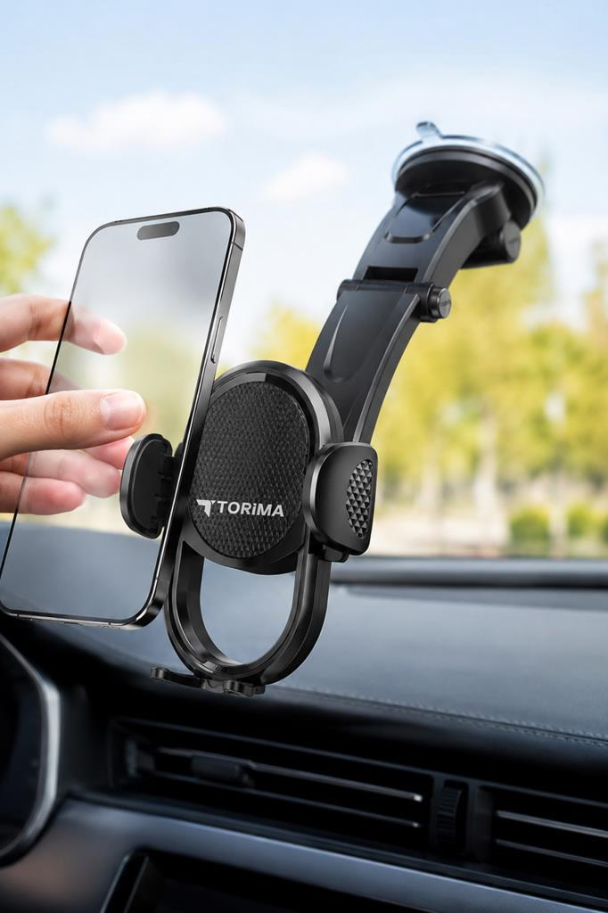 El, vantuzlu siyah araç tutucusunda bir akıllı telefon tutuyor.