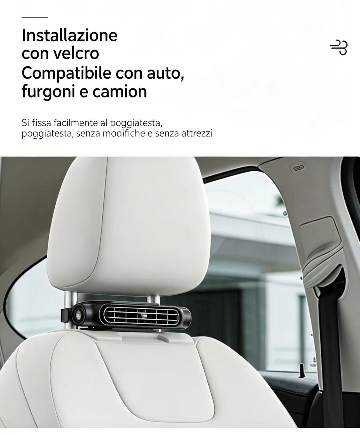 Una ventola nera è fissata al retro di un sedile per auto bianco.