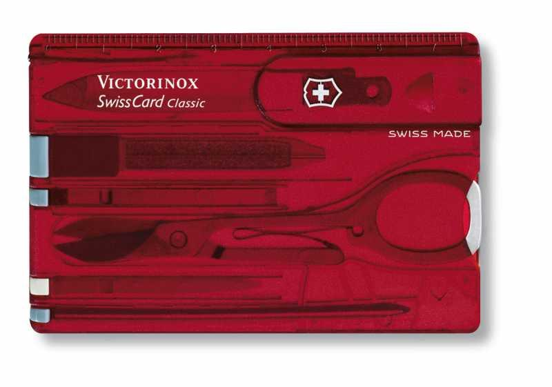 Makas, bıçak, cetvel gibi aletleri olan kırmızı Victorinox SwissCard Classic.