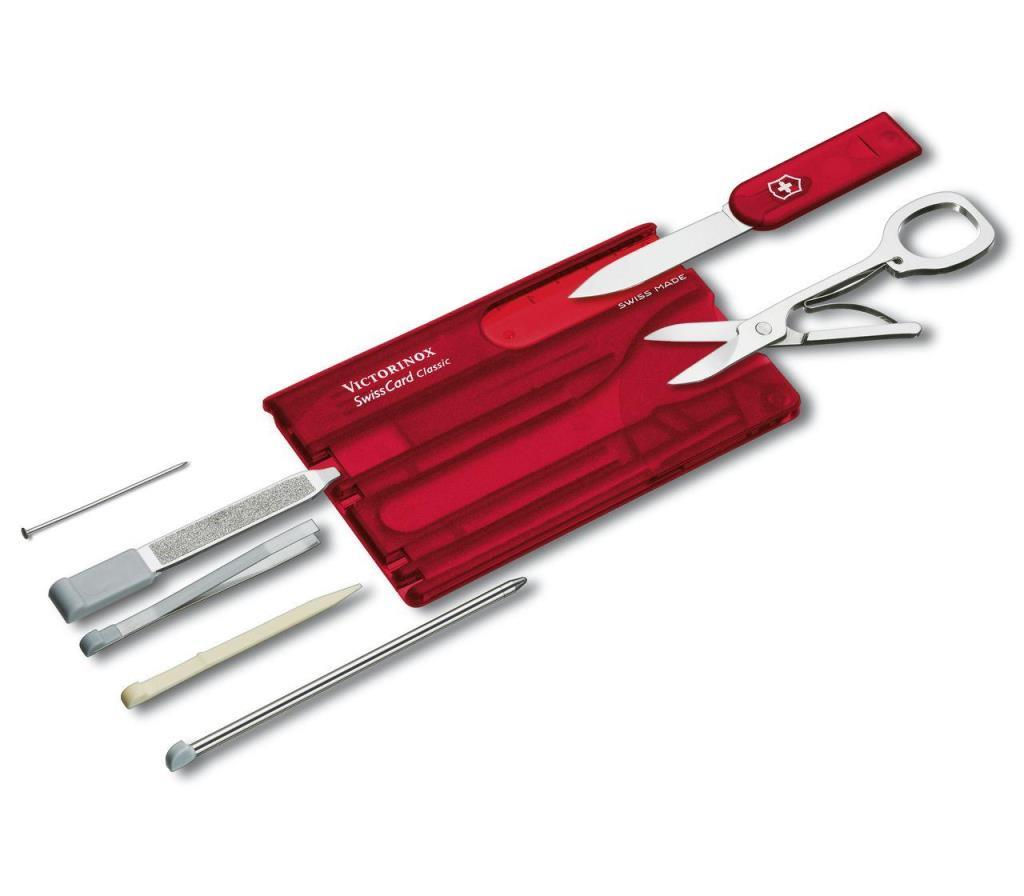 Makas ve bıçak gibi açılmış aletlere sahip kırmızı bir Victorinox Swiss Card Classic çok amaçlı alet.