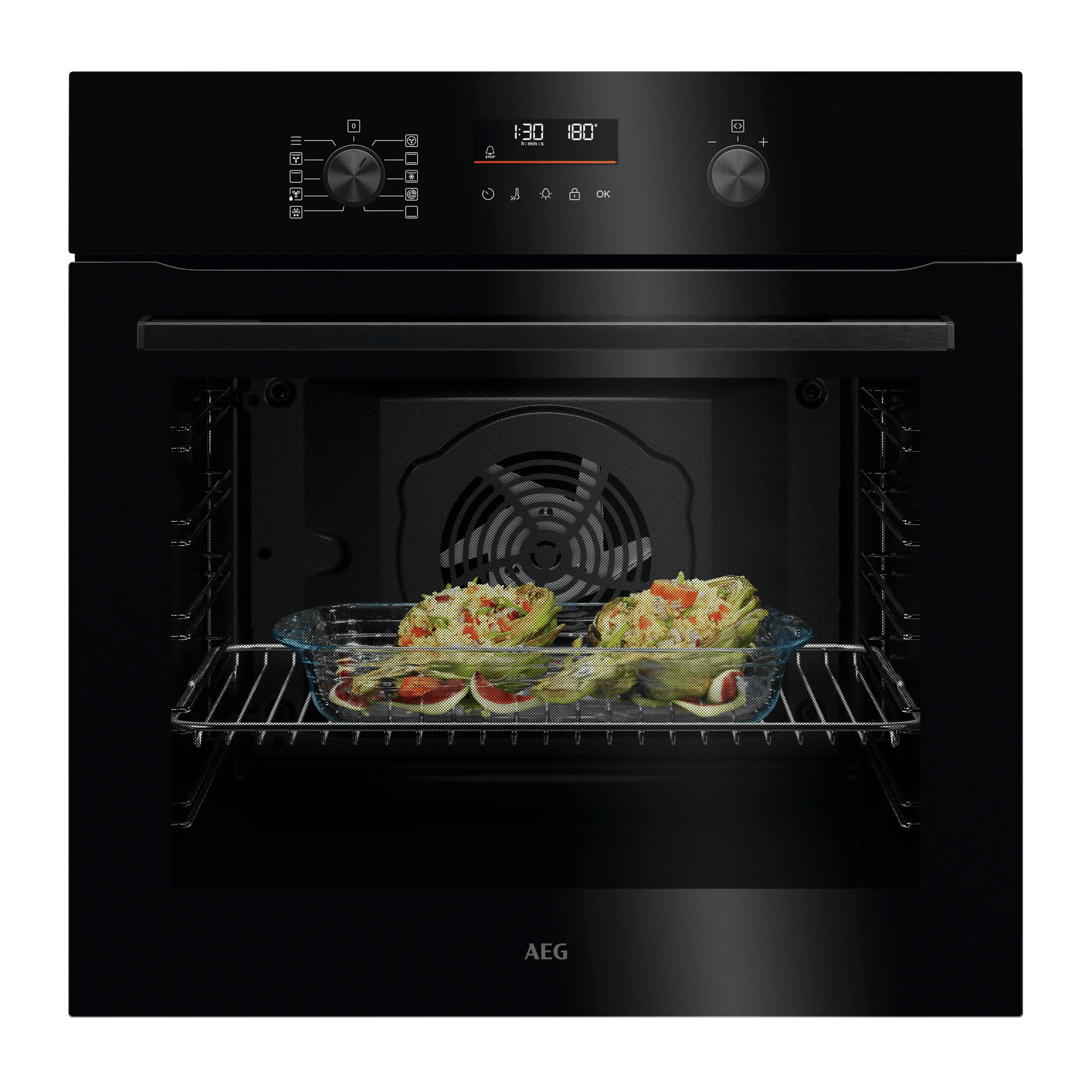 Un horno negro con alcachofas rellenas en una rejilla.