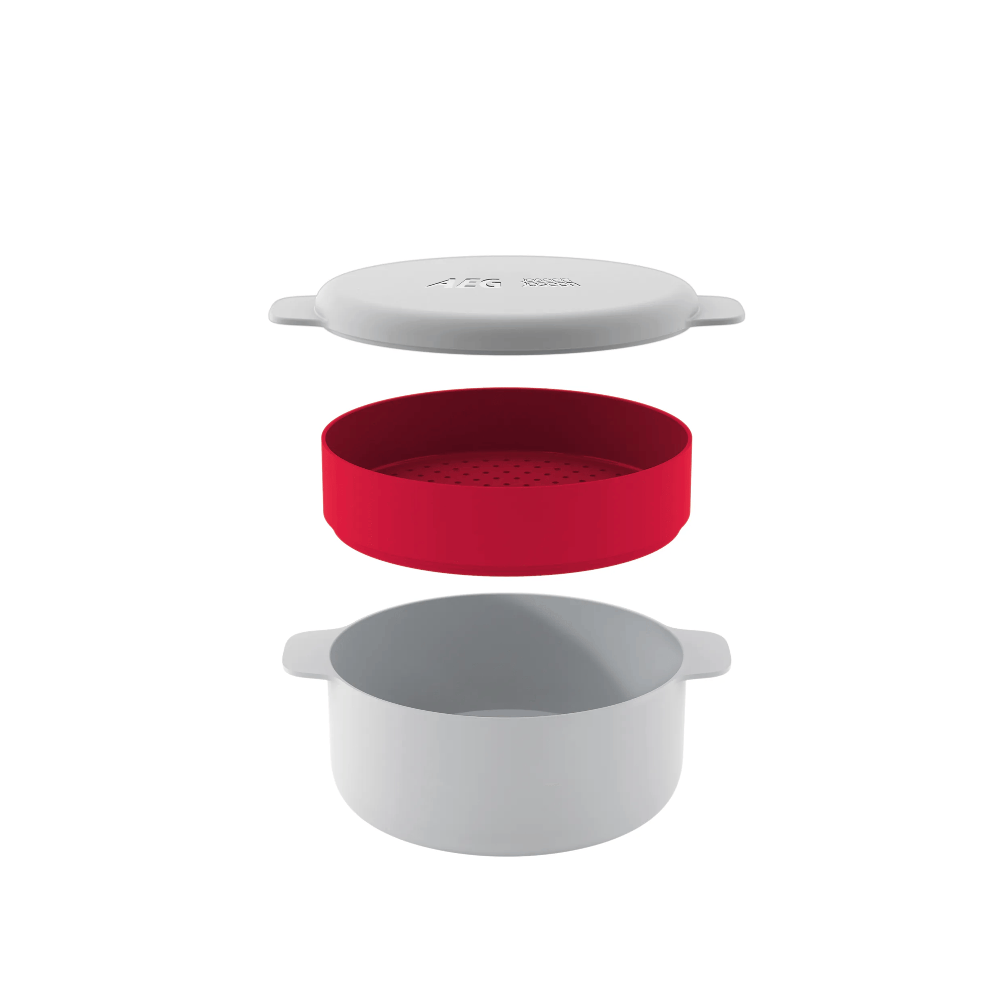 Una pentola bianca, un inserto per vaporiera rosso e un coperchio bianco impilati.